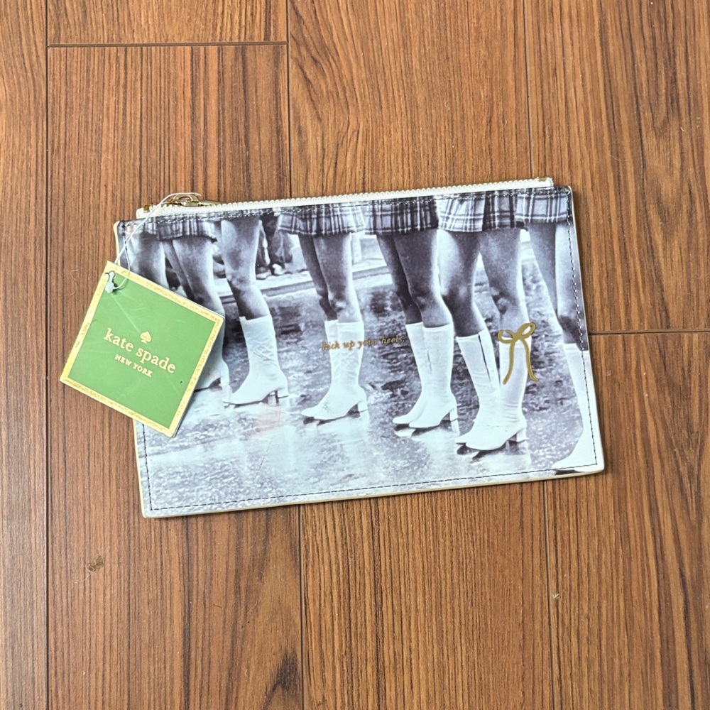 Kate Spade Kick Up Your Heels Black and White Pouch with Gold Accents